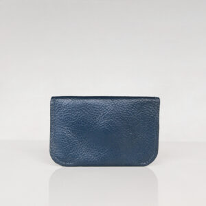 Back view of dark blue minimalist card wallet made from reclaimed and upcycled leather