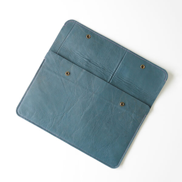 Open blue pouch for laptop made from reclaimed leather
