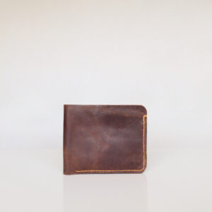 Dark brown bifold wallet made from repurposed leather. Contrasting yellow stitching
