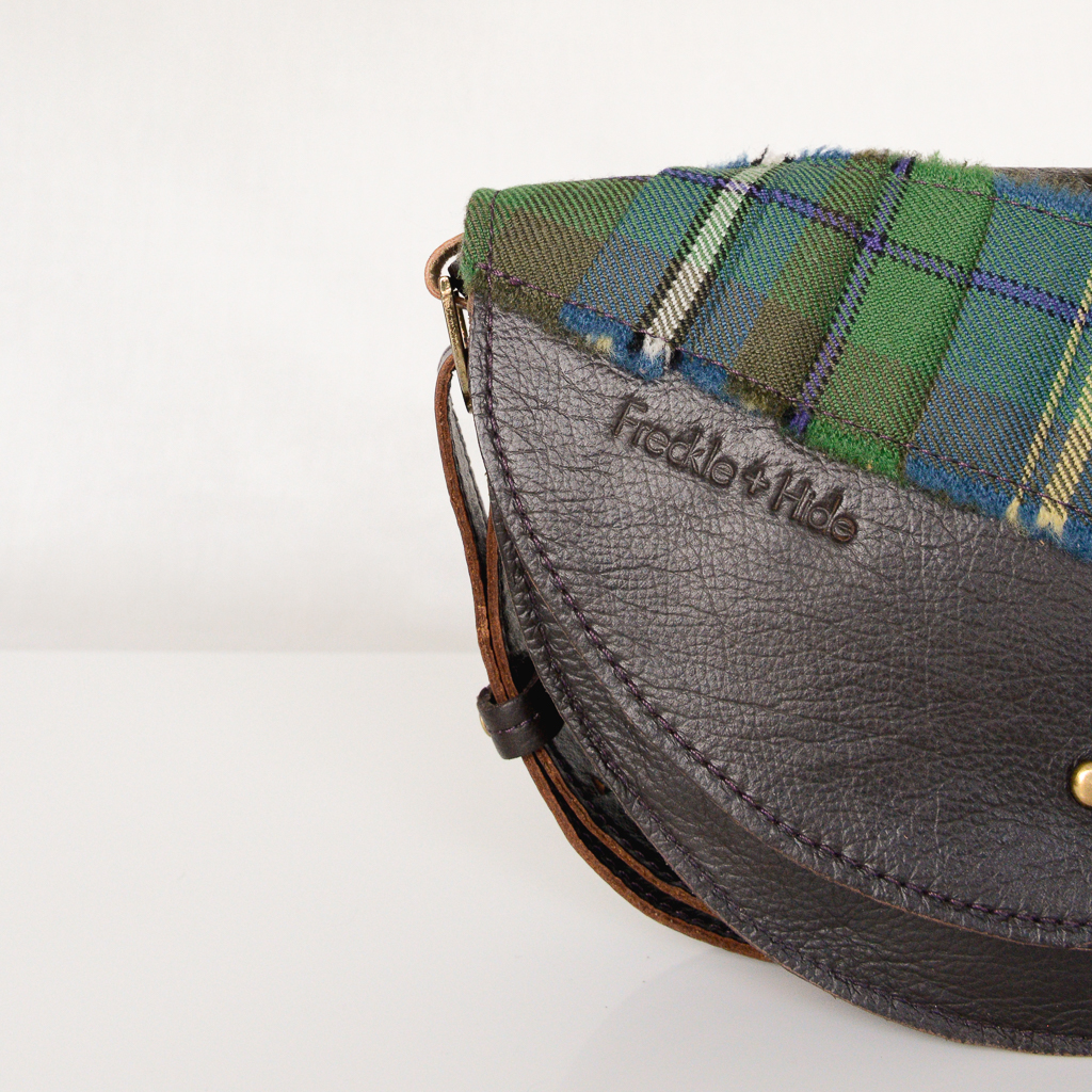 Brown leather and tartan semi circular bag with Freckle + Hide embossed