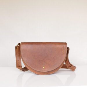 Luxury tan leather shoulder bag with yellow stitching and adjustable strap