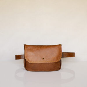 Rectangular tan leather waist bag with flap and stud closure with matching tan leather belt