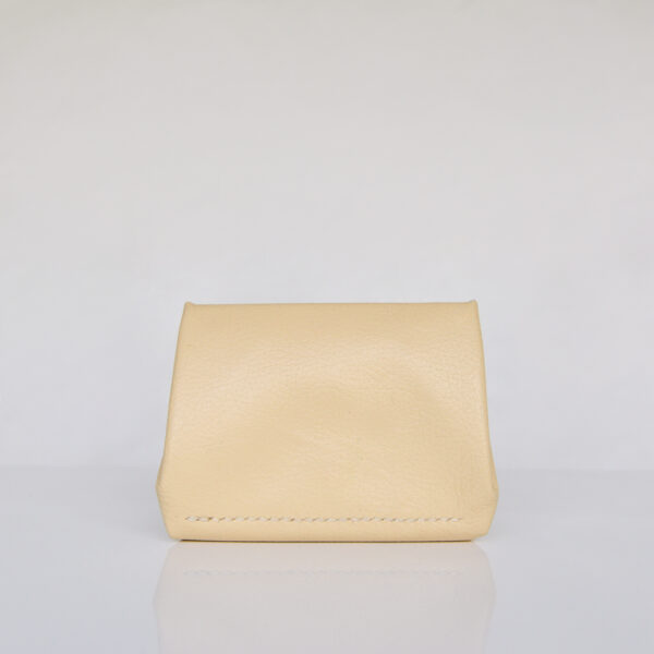 Rear view of yellow leather wallet showing cream stitching