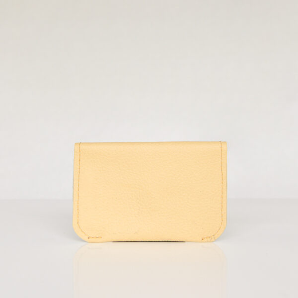 Back view of yellow minimalist card wallet made from reclaimed and upcycled leather