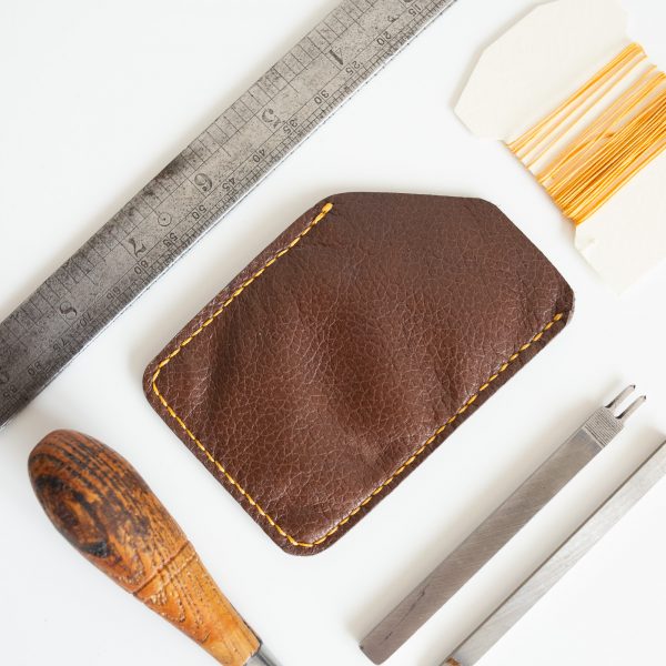 Zero waste leather card wallet handstitched with yellow linen thread