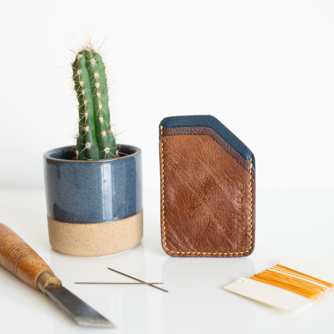 Brown and blue leather minimalist card wallet made from reclaimed leather