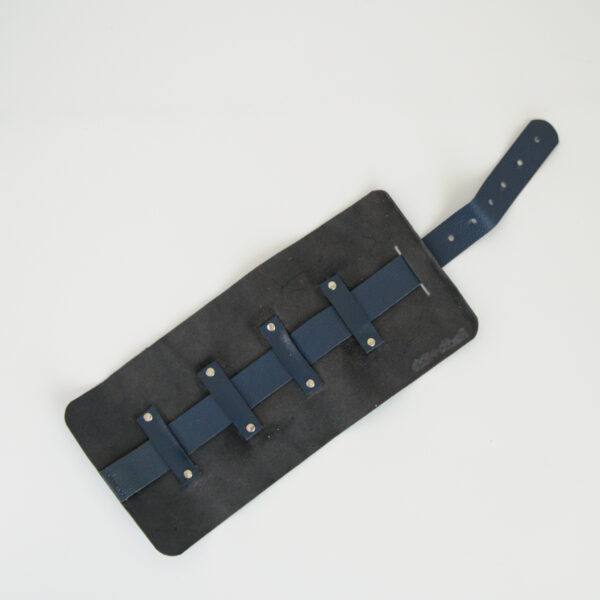 Blue cable tidy made from reclaimed and recycled leather
