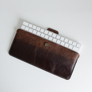 Brown upcycled leather pouch for an Apple