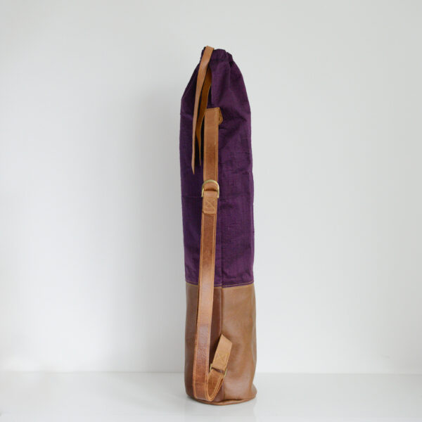 Yoga mat bag with adjustable leather strap made from reclaimed materials