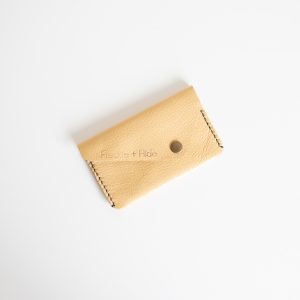 Yellow card wallet made from leather reclaimed from old sofas