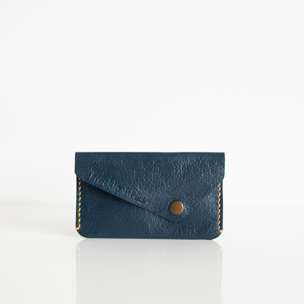 Blue leather card wallet with brass popper made from leather repurposed from old sofas