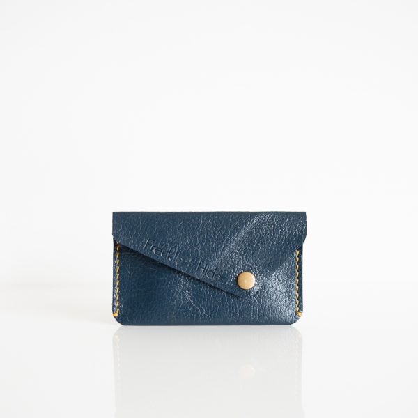 Navy blue wallet with contrasting yellow stitching made from reclaimed leather