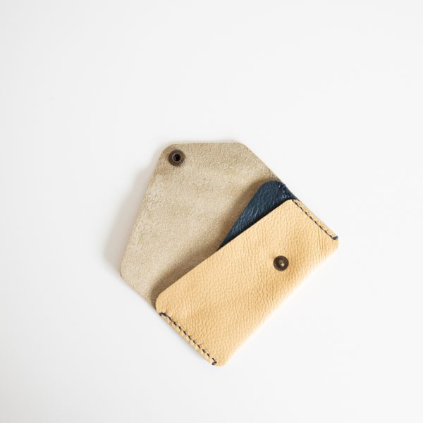 Leather and blue card wallet with contrasting blue stitching and 2 card slots